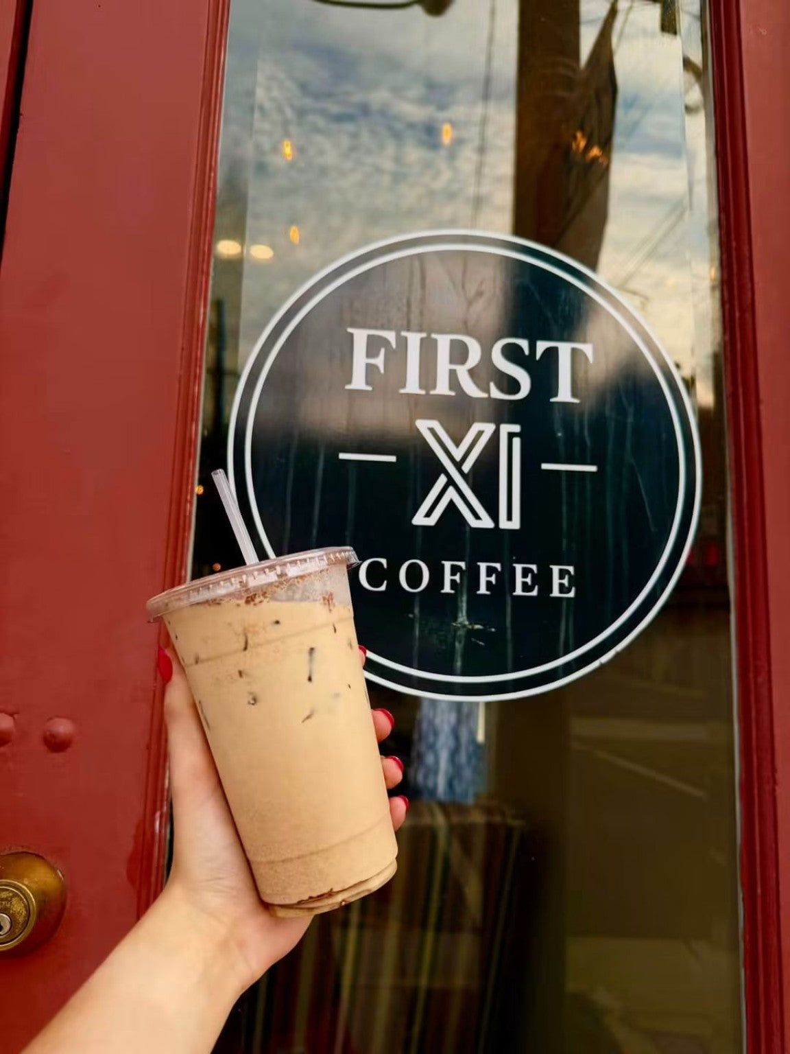 Iced coffee at First XI Coffee Buchanan red door