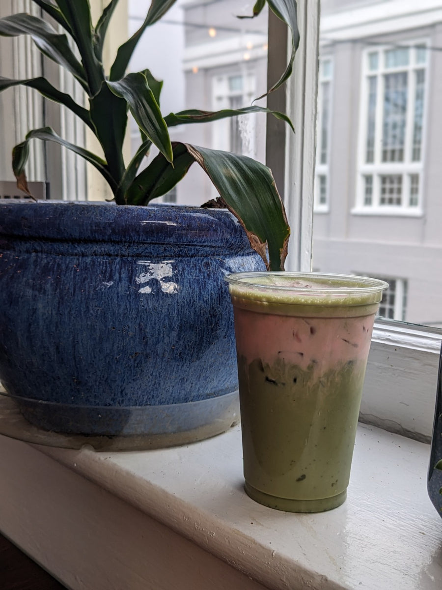 Green iced drink by the window