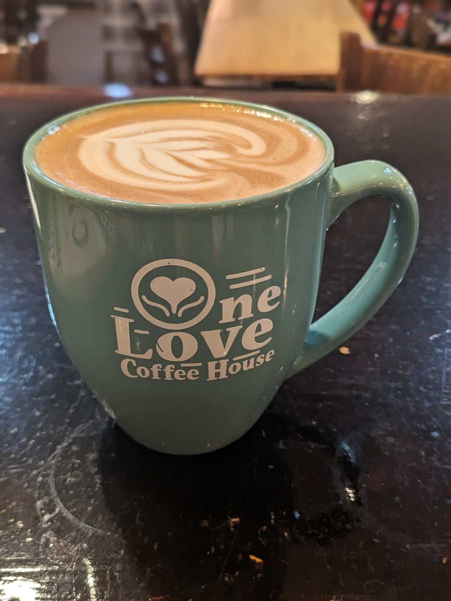 Latte in a One Love Coffee House mug