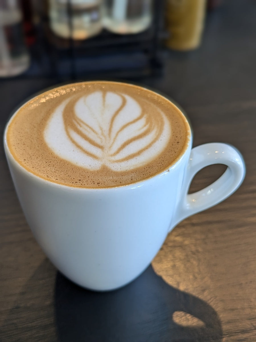Latte art in a white cup